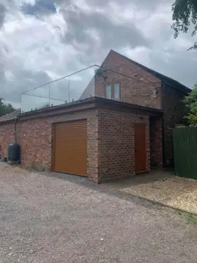 Click Here To Enlarge This Photo Of Garage with Balcony